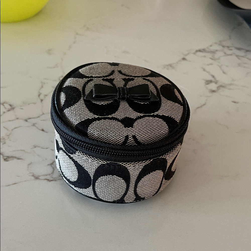 Coach Black and White Signature Round Jewelry Pouch